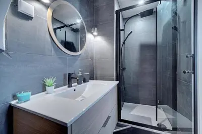 a bathroom with a sink and a shower at Le ART - 500m des plages - Clim - Verrière Côte d'Azur in Cannes