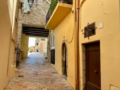 an alley in an alley way between two buildings at Le Barri By SCLS Locations in Cannes