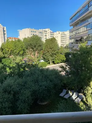 a view of a park in a city with buildings at Beautiful Apartment 2mn walking distance from La Croisette and The Beach in Cannes