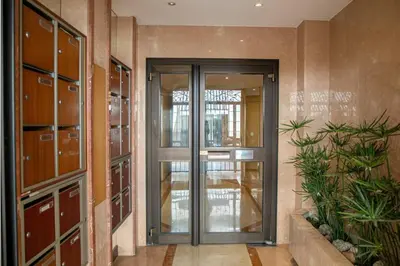 an entrance to a building with a glass door at Coeur De Cannes in Cannes
