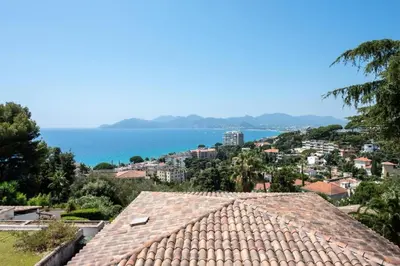 a view of the ocean from a roof at Résidence Cannes Villa Francia - maeva Home - Appartement 2 pièces 6 personnes - Sélection MAE-2534 in Cannes