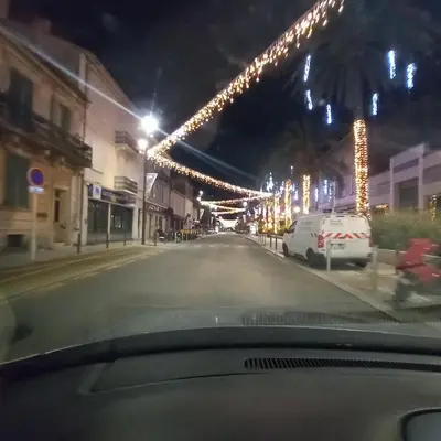 a view of a street at night with christmas lights at Villa Maupassant 06 Cannes in Cannes