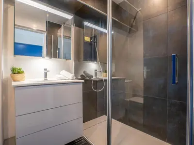 a bathroom with a shower and a sink at Apartment La Croix des Gardes by Interhome in Cannes