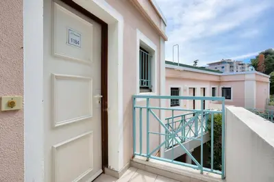 a door of a building with a balcony at Résidence Cannes Villa Francia - maeva Home - Appartement 2 pièces 4 personnes - Budget MAE-8884 in Cannes