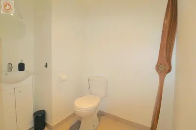 a bathroom with a toilet and a sink at ALC - MONT8 - 8 min Palais and Beaches in Cannes