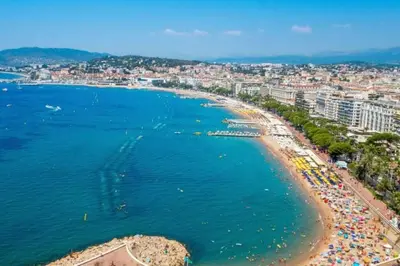 an aerial view of a beach in a city at Cosy apartment 39M2, two steps from rue d'Antibes and Croisette in Cannes