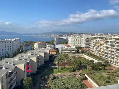 an aerial view of a city with buildings and the ocean at Studio Mimosa Croisette in Cannes