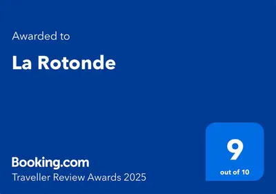 a screenshot of a cell phone with the text awarded to la rotonde at La Rotonde in Cannes