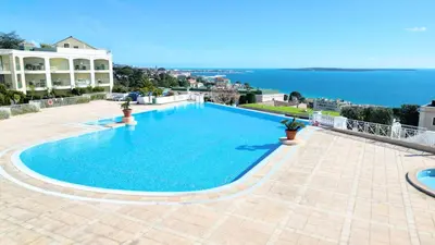 a large swimming pool on top of a building at Appartement 0321, piscine - parking - proche plages - Palmazur Vacances in Cannes