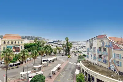 a view of a street in a city with buildings at Great Sea View YourHostHelper in Cannes
