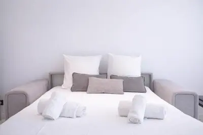 a living room with a couch and a table at 