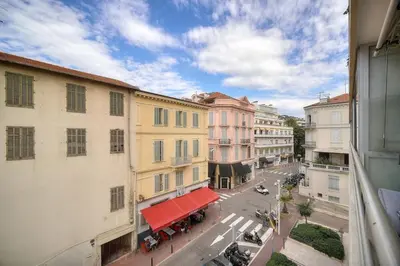 a view of a city street with buildings at Cannes Luxury Rental - Stunning apartment with terrace to rent Grand Hotel in Cannes