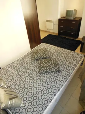a bed with two pillows on it in a bedroom at 1 Bedroom Joffre 2 mins from Palais des Festivals 263 in Cannes