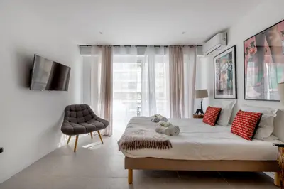 a bedroom with a bed with two teddy bears on it at Agence des Résidences - Appartements privés du 45 CROISETTE - Superieur in Cannes