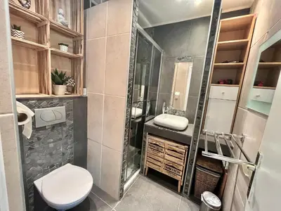 a bathroom with a toilet and a sink and a shower at Jolies Lavandes, by Welcome to Cannes in Cannes