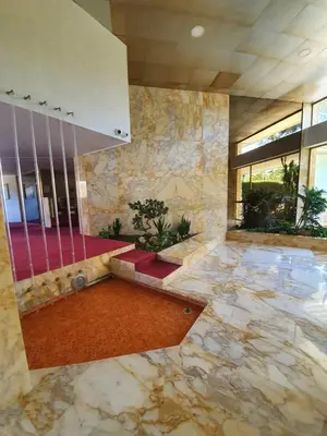 a large lobby with a stone floor and a staircase at Jolies Lavandes, by Welcome to Cannes in Cannes