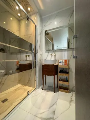 a bathroom with a shower and a sink at Venue C - Luxurious & Spacious - Mansion - Elevator - Patio in Cannes