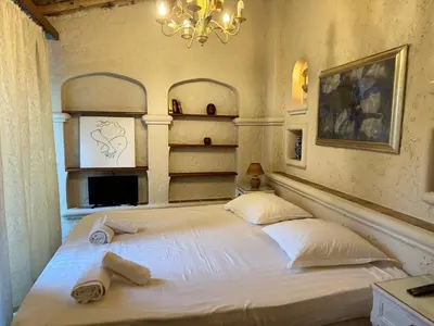 a bedroom with a bed with two towels on it at Somptuous exotic villa in Cannes in Cannes