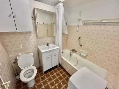 a bathroom with a toilet and a sink and a tub at Kent studio by Welcome to Cannes in Cannes