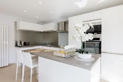 a balcony with a view of a building at Carlton area XXL luxe 1 bed with large terrace in Cannes