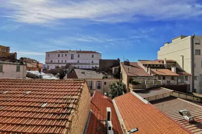 a view of a city with roofs and buildings at Nice 2 bedrooms Meynadier at 2 min BeachPalais in Cannes