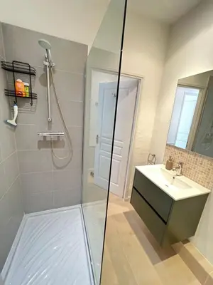 a bathroom with a shower and a sink at Nice 2 bedrooms Meynadier at 2 min BeachPalais in Cannes