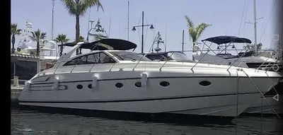 a white boat is docked in the water at Yacht 17M Cannes Croisette Port Canto,3 Ch,clim,tv in Cannes
