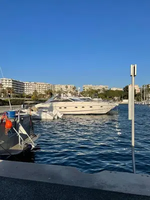 a couple of boats docked in a harbor at Yacht 17M Cannes Croisette Port Canto,3 Ch,clim,tv in Cannes