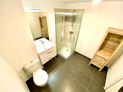 a bathroom with a shower and a toilet and a sink at Paul Doumer #2 By SCLS Locations in Le Cannet