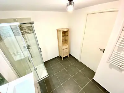 a bathroom with a shower and a glass door at Paul Doumer #2 By SCLS Locations in Le Cannet