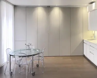 a dining room with a glass table and chairs at Arundel Croisette 100m Beach, Palais Free Parking AC Fibre in Cannes