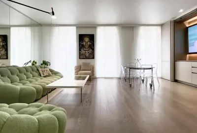 a living room with a couch and a table at Arundel Croisette 100m Beach, Palais Free Parking AC Fibre in Cannes