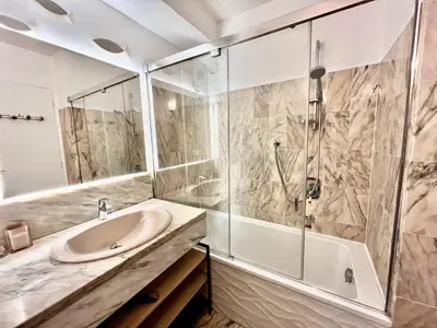 a bathroom with a sink and a shower at Les jardins de la Croisette 6, by Welcome to Cannes in Cannes