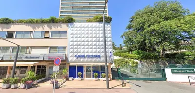 a building on the corner of a street at Château Picaud By SCLS Locations in Cannes