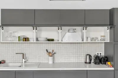 a kitchen with a sink and a counter top at 3 chambres - Marché Forville - Proche du Palais in Cannes