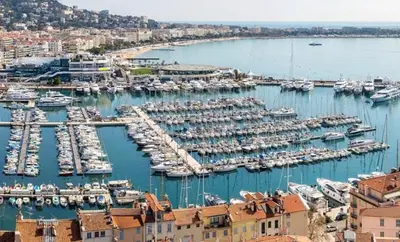 a bunch of boats docked in a harbor at APPARTEMENT WOOD DESING PROCHE CANNES in Le Cannet