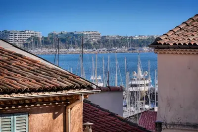 a view of a harbor with boats in the water at IMMOGROOM - Refurbished - Suquet - Sea view in Cannes