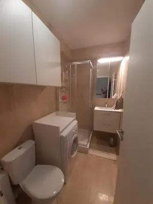 a small bathroom with a toilet and a sink at IDEAL POUR COUPLE in Cannes