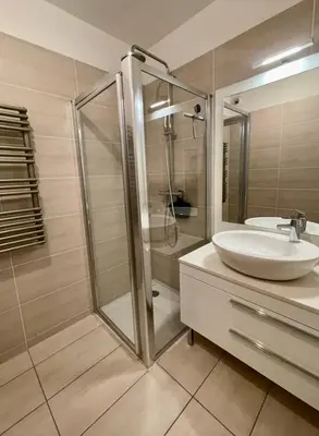 a bathroom with a sink and a shower at Oxford 1-bedroom apartment in a new building with pool and parking in Cannes