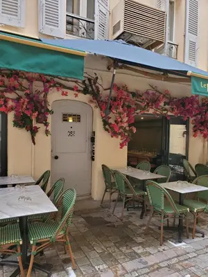 a group of tables and chairs outside of a restaurant at STUDIO CENTRE CANNES FORVILLE in Cannes