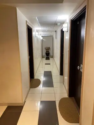 a hallway of a hotel with a hallwayngth at T2 proche de la gare, à 10 minutes à pieds de la Croisette, piscine & parking dans résidence de haut standing in Cannes