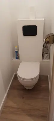 a bathroom with a white toilet in a room at T2 Cannes center in Cannes