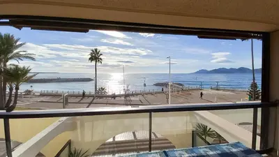 a view of the beach from a balcony at Les terrasses in Cannes