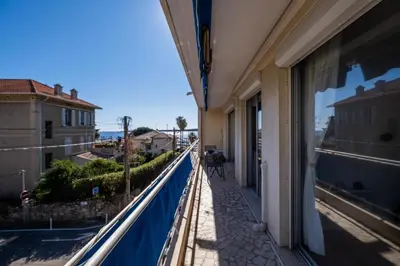 a balcony of a building with a view of a street at 2Br Apartment 100m from Beaches Terrace & Parking in Cannes