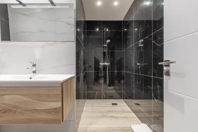 a bathroom with a sink and a shower at Residence Meynadier - apartments - New - AC - Wifi - Close Beach and Palais - LRA Cannes in Cannes