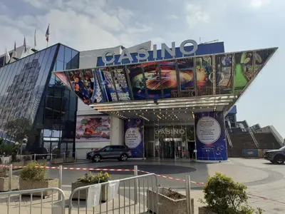 a parking lot in front of a building at FORVILLE APARTMENT Cannes in Cannes