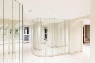 a large glass wall in a room with white walls at MIPIM Dispo Perle Rare Croisette A côté de l Hôtel Carlton Centre Croisette 5mn du Palais 4P Plage 1Mn in Cannes