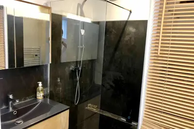 a bathroom with a shower and a sink at Cosy 42m With Balcony Nice View And Wifi in Cannes