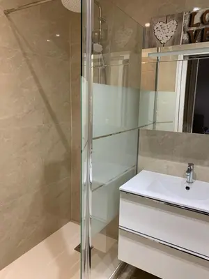 a bathroom with a sink and a shower at 2 pièces cannes centre in Cannes