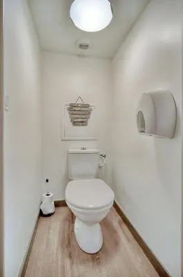 a bathroom with a white toilet in a room at Agréable 2 pièces TERRASSE, PISCINE, Clémenceau A1B235 in Cannes